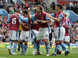 Patrik Berger of Aston Villa celebrates to the crowd after Gabriel Agbonlahor scored the equalizer during the Barclays Premiership match between Aston Villa and Wigan Athletic at Villa Park.